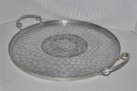 Hand wrought aluminum tray - Vintage Wilson Specialties Hand Wrought Aluminum, entertaining serving, Decorative Tray. Sorry, this item has sold. Shipping to United States: Free $0.00. Ask ...